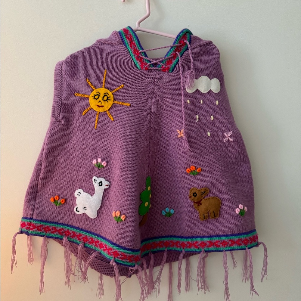 Purple Knit Poncho with Animal and Sun Design